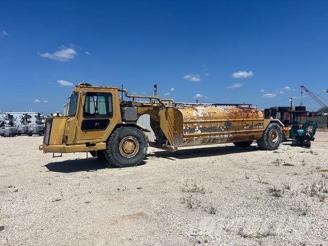 CAT 613C Поливочные машины