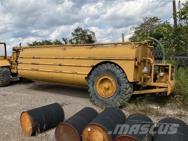 CAT 613C Поливочные машины