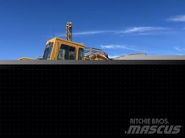 CAT 633E Скреперы