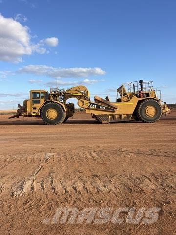 CAT 657G Скреперы