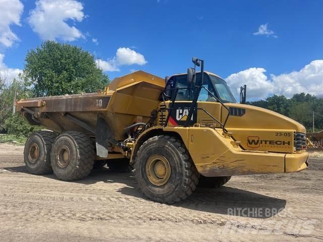 CAT 740 Шарнирно-сочленённые самосвалы