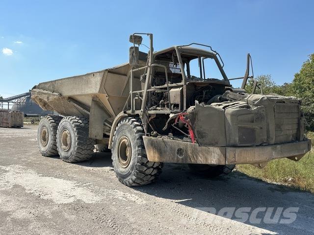 CAT 740B Шарнирно-сочленённые самосвалы