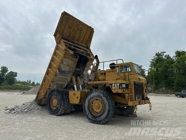 CAT 769C Шарнирно-сочленённые самосвалы
