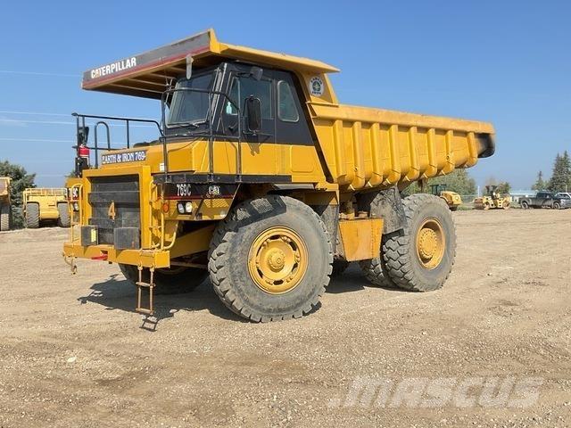 CAT 769C Шарнирно-сочленённые самосвалы