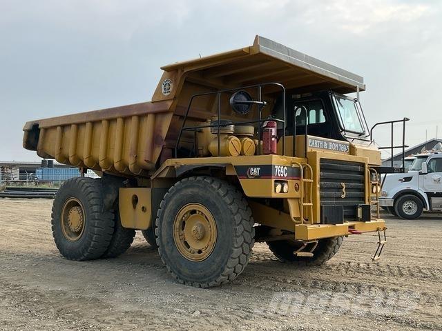 CAT 769C Шарнирно-сочленённые самосвалы