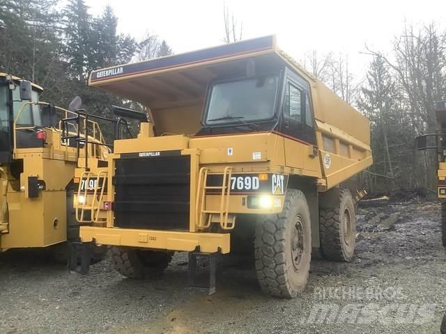 CAT 769D Шарнирно-сочленённые самосвалы