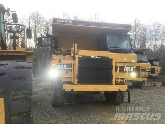CAT 769D Шарнирно-сочленённые самосвалы