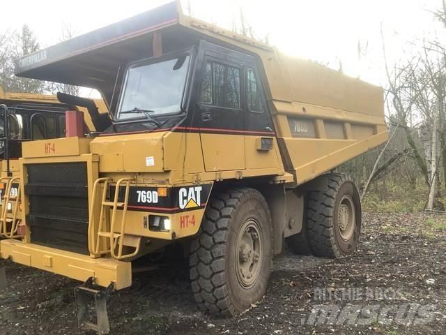 CAT 769D Шарнирно-сочленённые самосвалы
