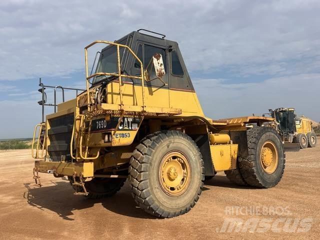 CAT 769D Шарнирно-сочленённые самосвалы