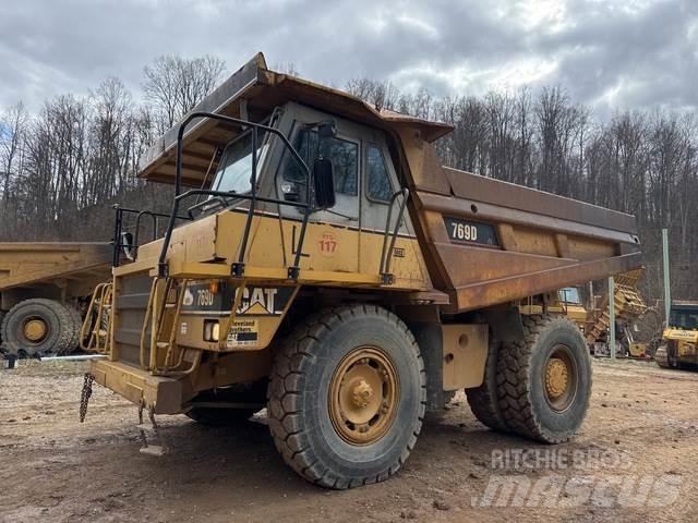 CAT 769D Шарнирно-сочленённые самосвалы