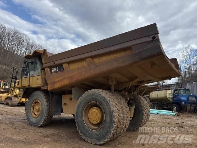 CAT 769D Шарнирно-сочленённые самосвалы