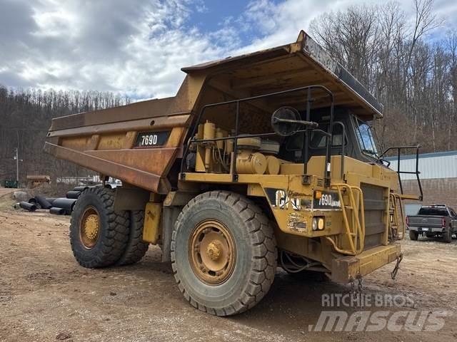 CAT 769D Шарнирно-сочленённые самосвалы