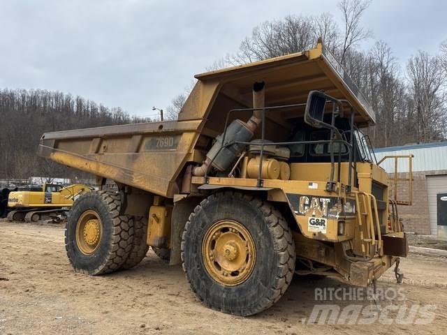 CAT 769D Шарнирно-сочленённые самосвалы