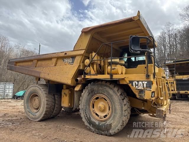 CAT 769D Шарнирно-сочленённые самосвалы