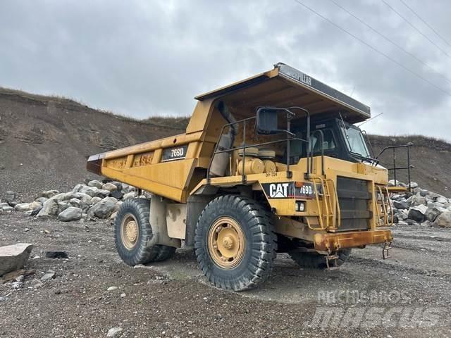 CAT 769D Шарнирно-сочленённые самосвалы