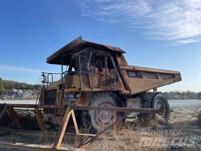 CAT 769D Шарнирно-сочленённые самосвалы