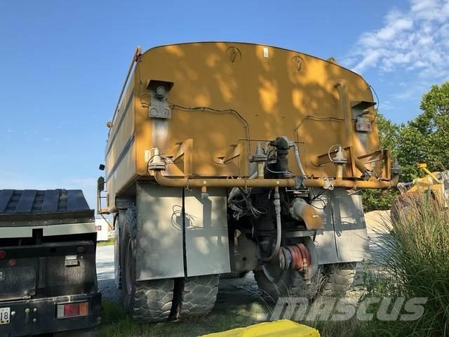 CAT 775D Шарнирно-сочленённые самосвалы
