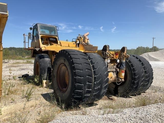 CAT 775E Шарнирно-сочленённые самосвалы