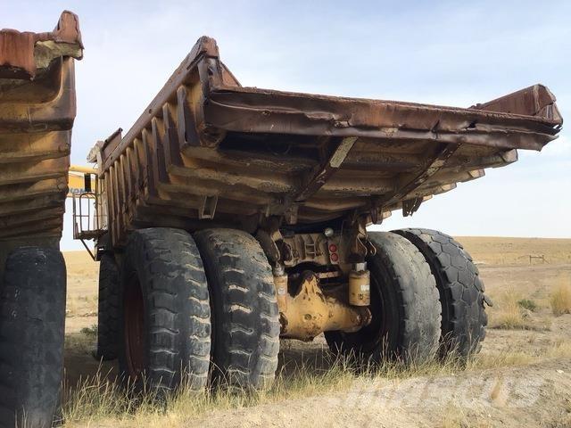 CAT 777 Шарнирно-сочленённые самосвалы
