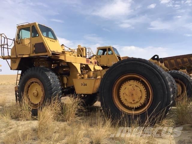 CAT 777 Шарнирно-сочленённые самосвалы