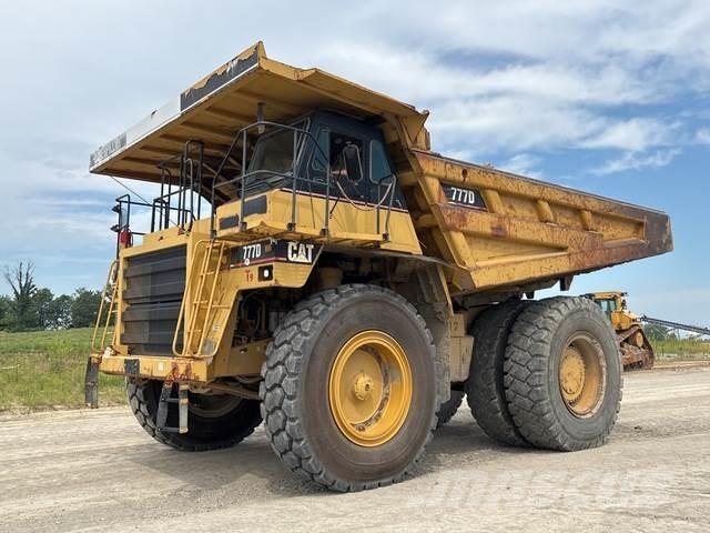 CAT 777D Шарнирно-сочленённые самосвалы