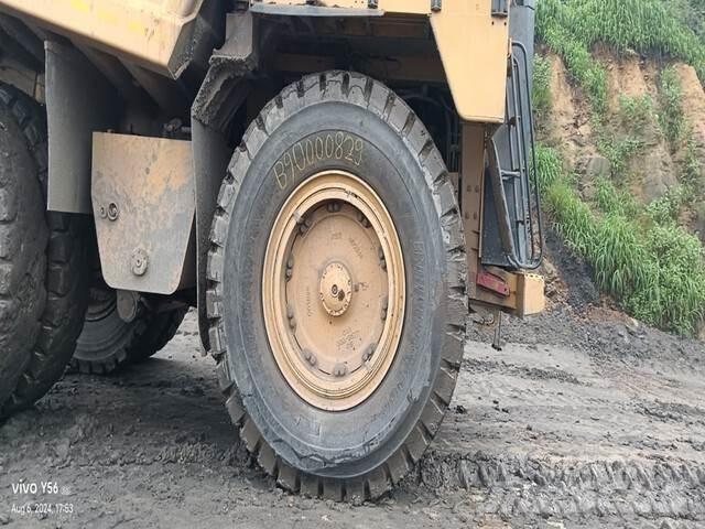 CAT 777E Шарнирно-сочленённые самосвалы