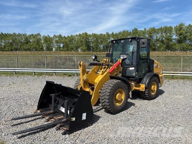 CAT 906 Фронтальные погрузчики