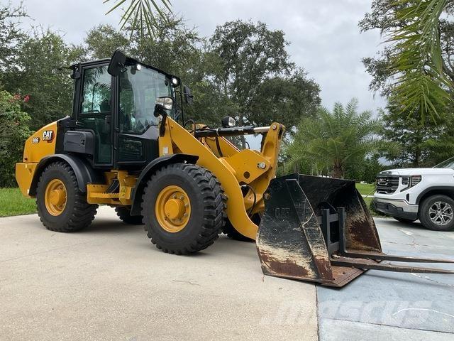 CAT 906 Фронтальные погрузчики