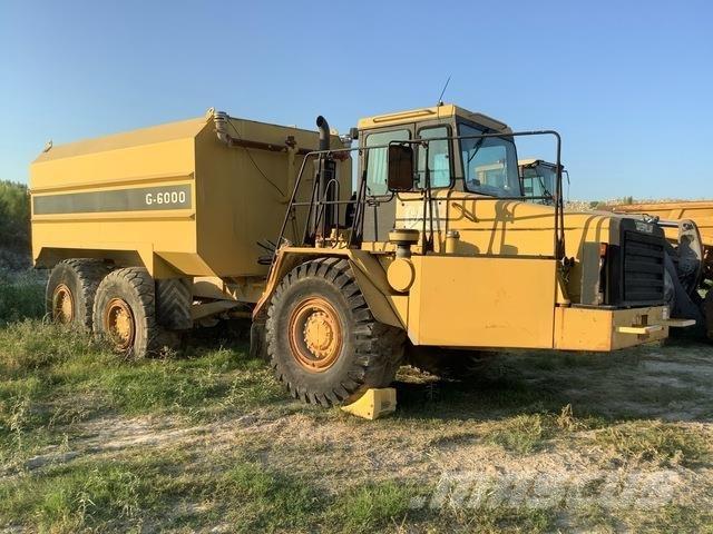 CAT D300E Поливочные машины