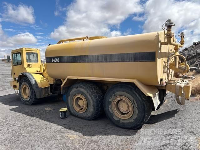 CAT D400D Поливочные машины