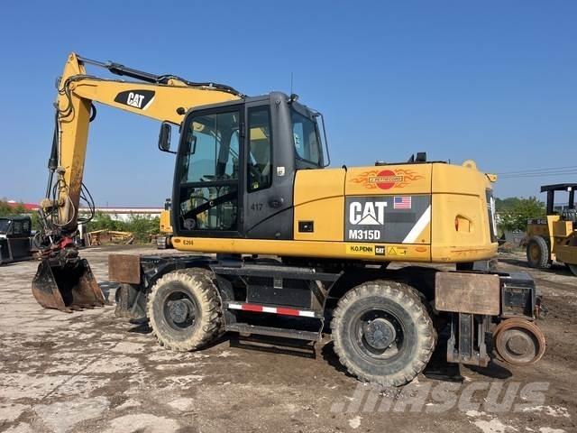 CAT M315D Колёсные экскаваторы