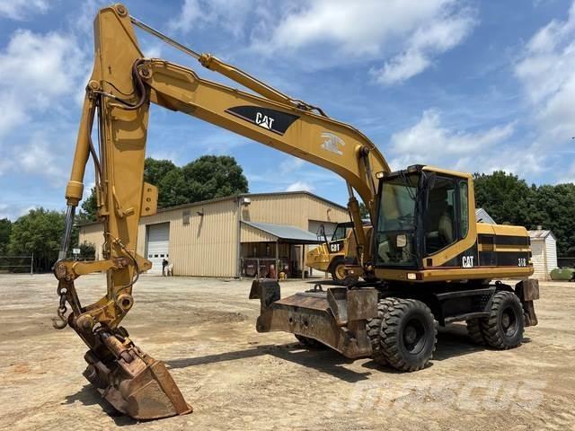CAT M318 Колёсные экскаваторы