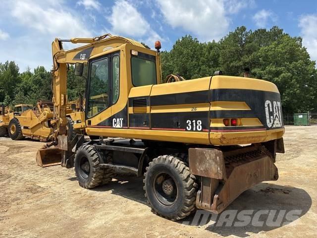CAT M318 Колёсные экскаваторы
