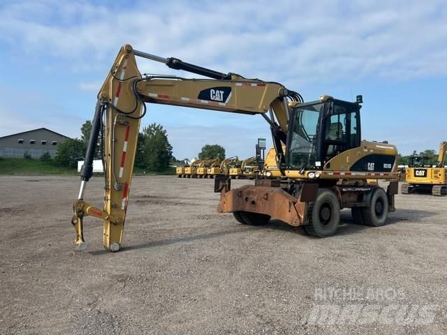 CAT M318D Колёсные экскаваторы