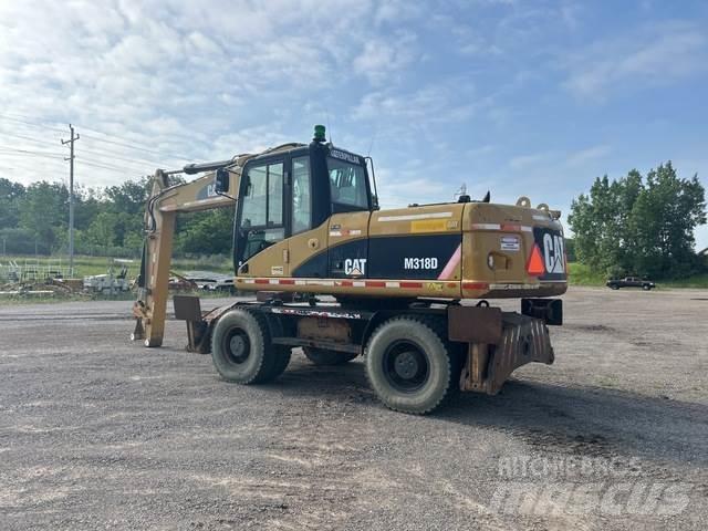 CAT M318D Колёсные экскаваторы