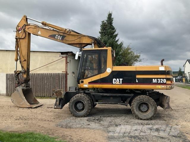 CAT M320 Колёсные экскаваторы