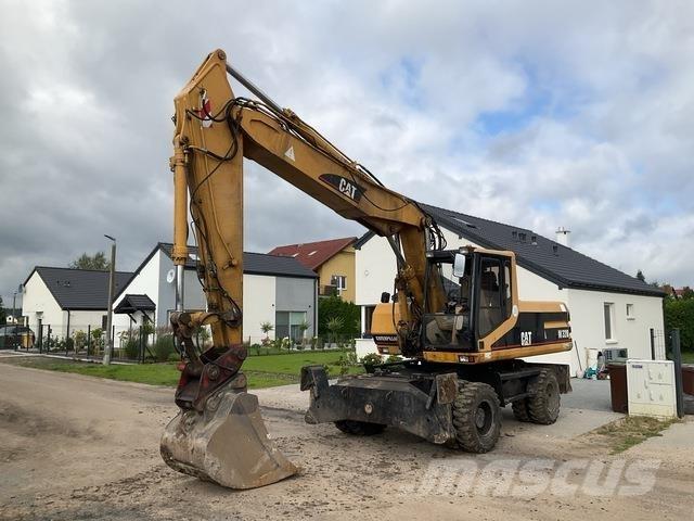 CAT M320 Колёсные экскаваторы
