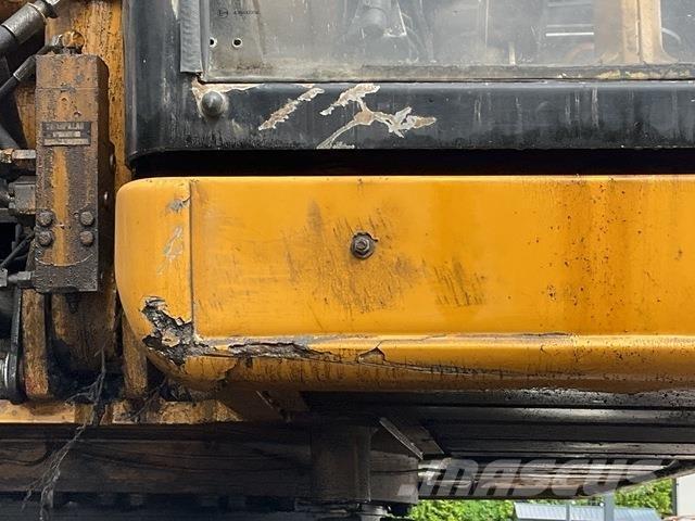 CAT M320 Колёсные экскаваторы