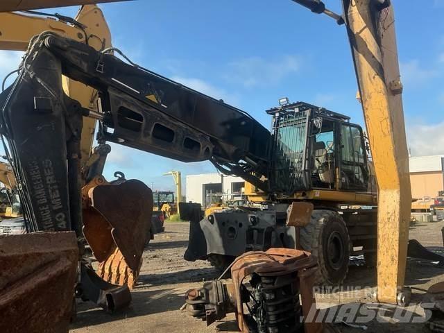 CAT M325CMH Лесопогрузчик