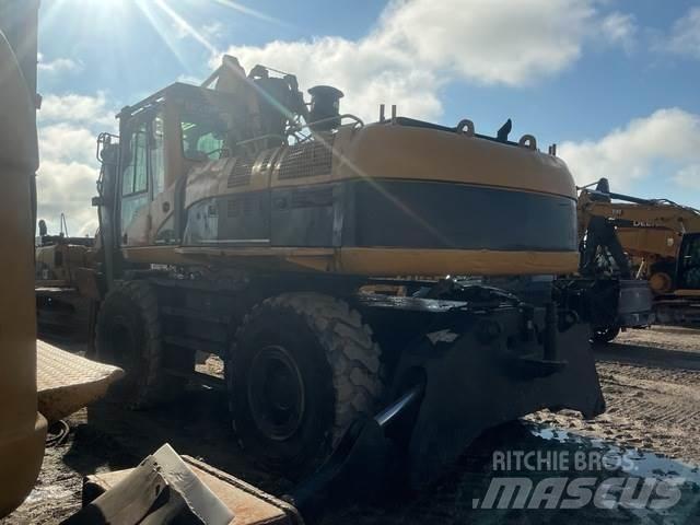 CAT M325CMH Лесопогрузчик