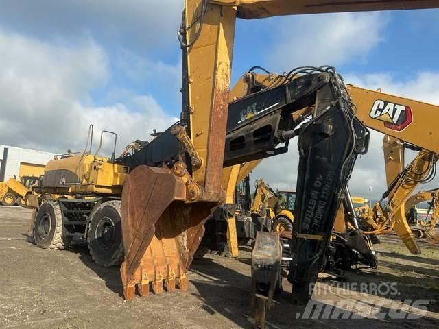 CAT M325CMH Лесопогрузчик