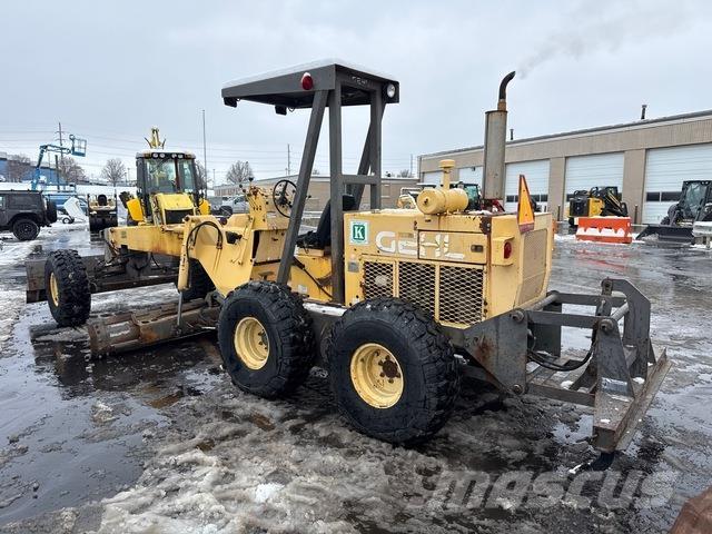 Gehl MG747B Грейдеры