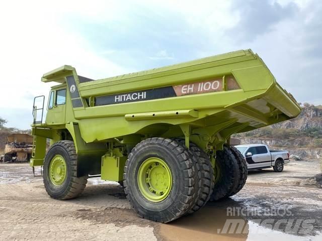 Hitachi EH1100 Шарнирно-сочленённые самосвалы