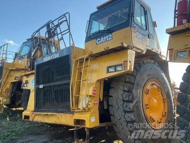 Komatsu 330M Шарнирно-сочленённые самосвалы