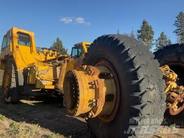 Komatsu 330M Шарнирно-сочленённые самосвалы