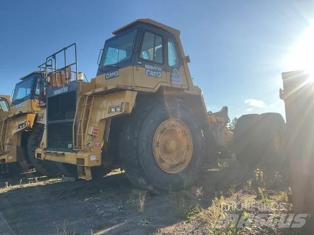 Komatsu 330M Шарнирно-сочленённые самосвалы