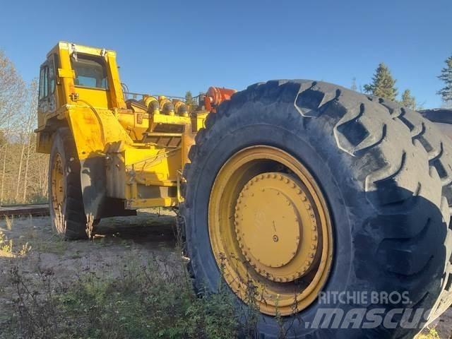 Komatsu 330M Шарнирно-сочленённые самосвалы