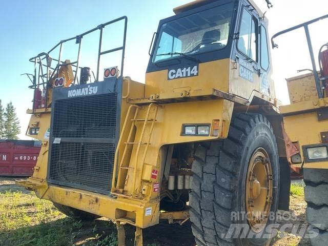 Komatsu 330M Шарнирно-сочленённые самосвалы