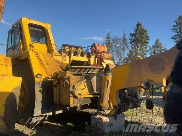 Komatsu 330M Шарнирно-сочленённые самосвалы