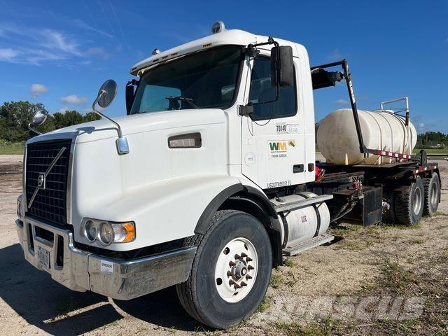 Volvo VHD64 Скиповые погрузчики